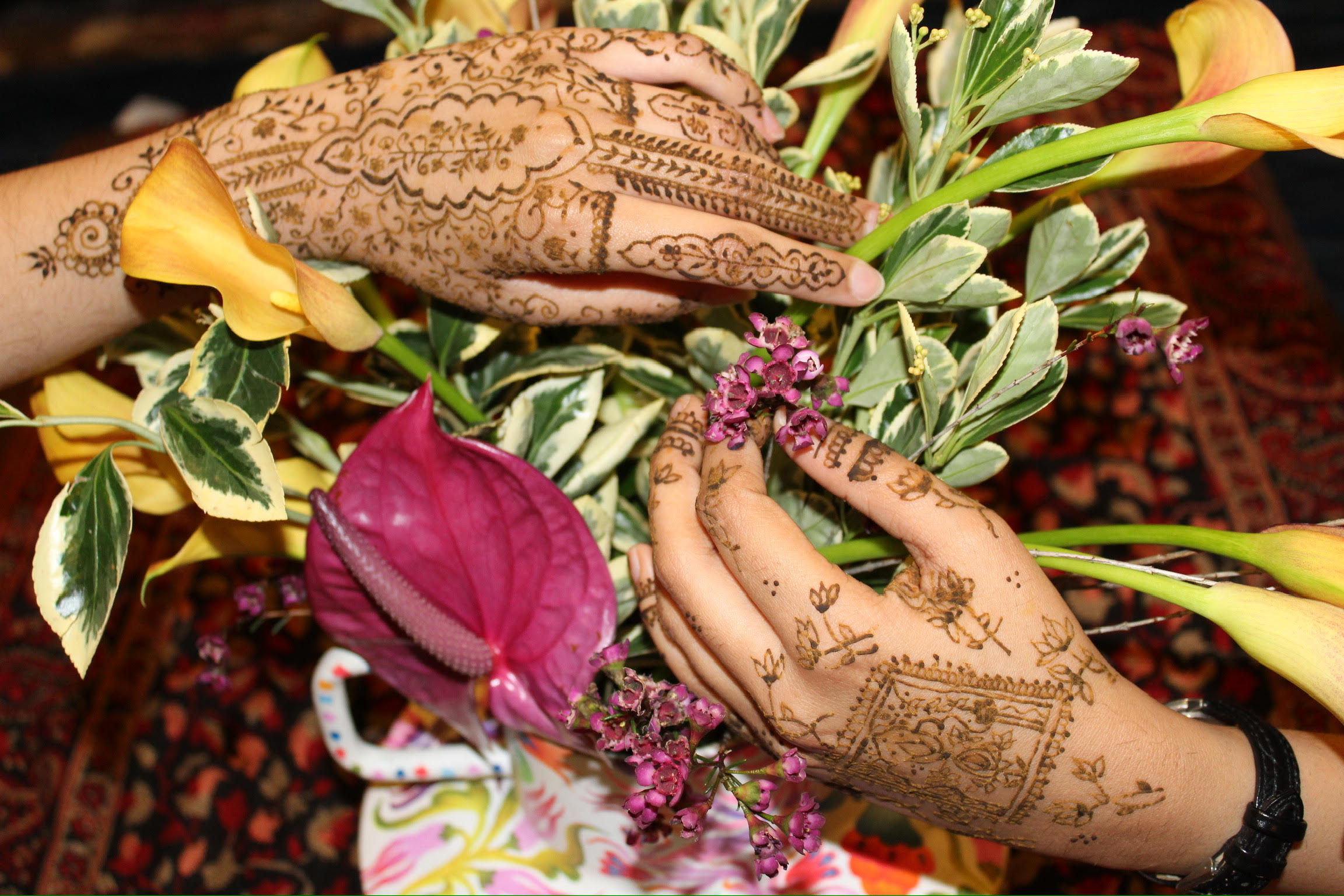 A detailed henna design on a hand